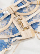 Blue bustier top lingerie with back lacing and gold chain details, adjustable for perfect fit